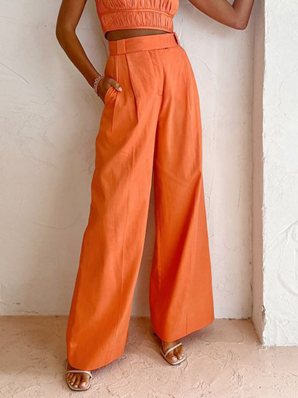 Losse broek met hoge taille en wijde pijpen