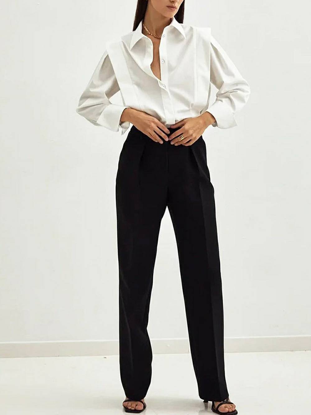 Top met lange mouwen en geplooide details