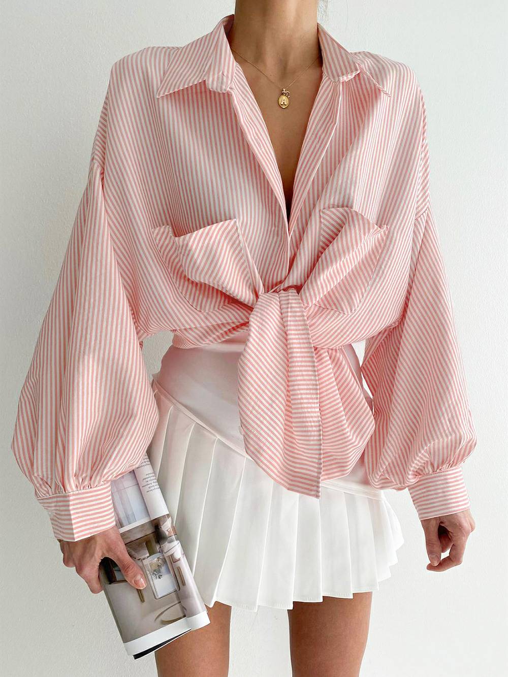 Gestreepte blouse met lange gezwollen mouwen