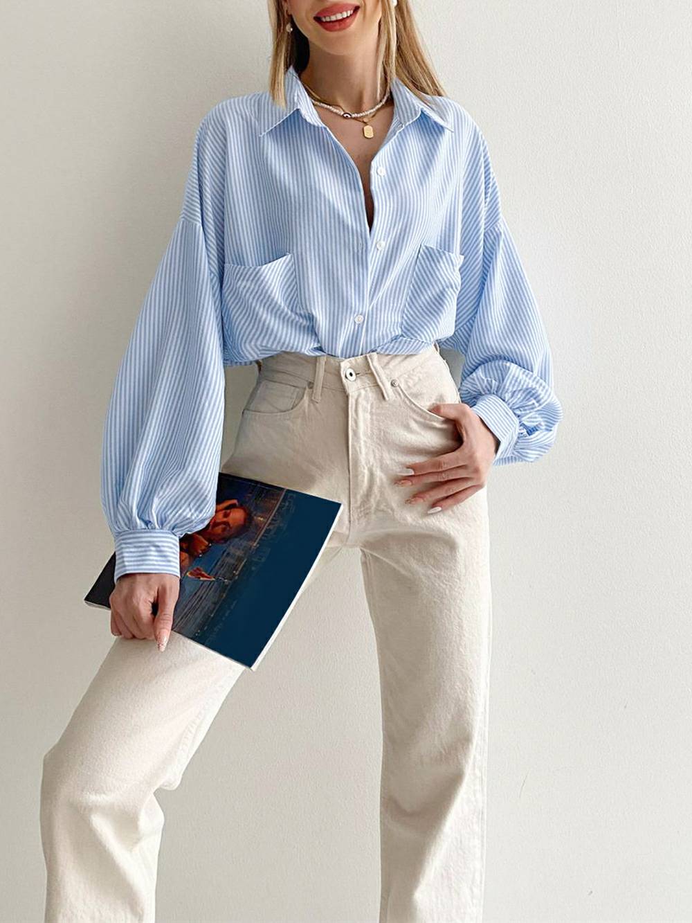 Gestreepte blouse met lange gezwollen mouwen