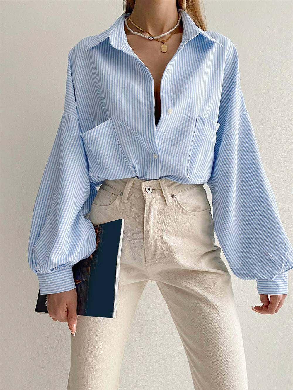 Gestreepte blouse met lange gezwollen mouwen