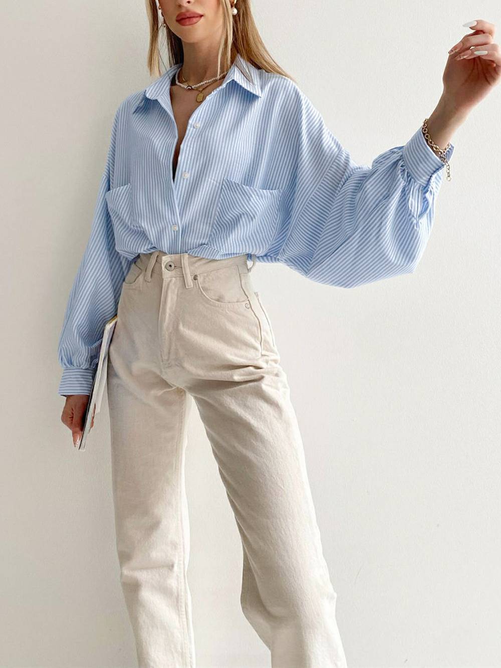 Gestreepte blouse met lange gezwollen mouwen
