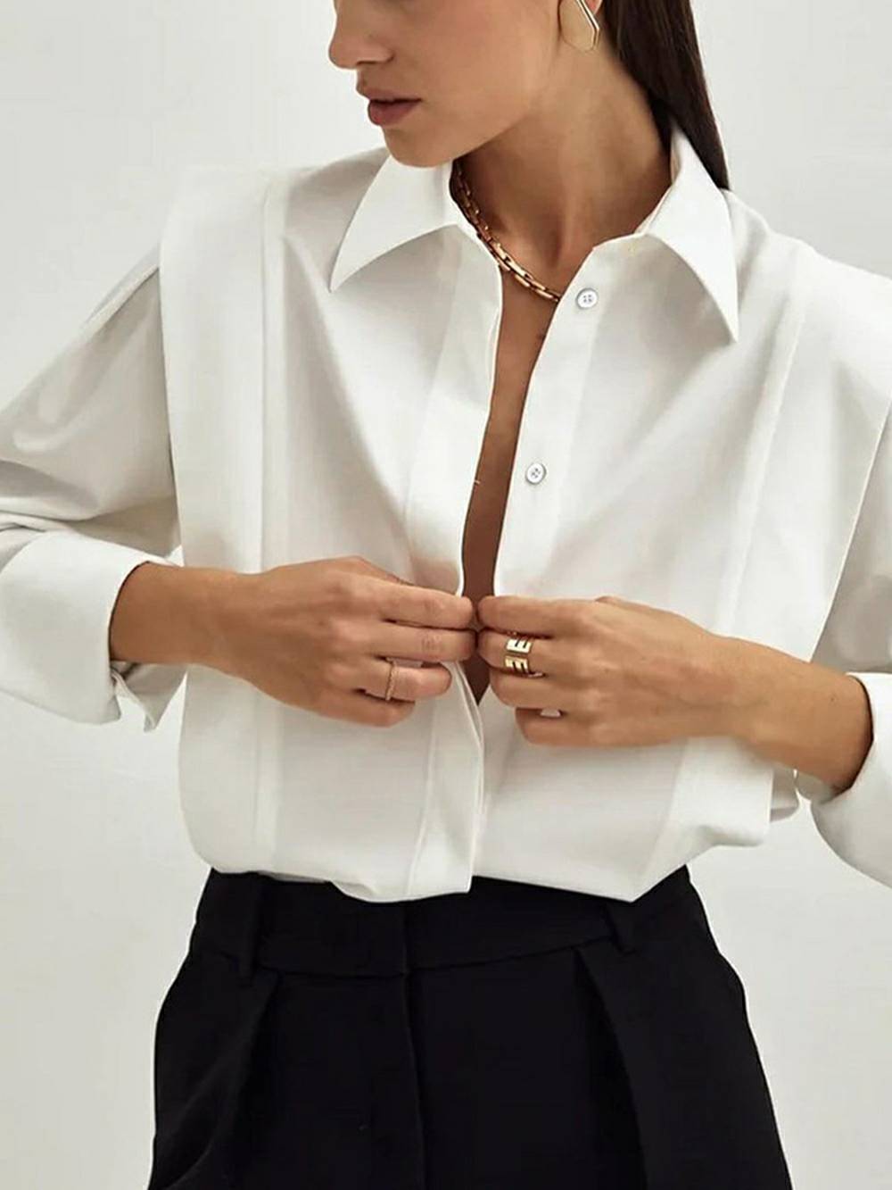 Top met lange mouwen en geplooide details