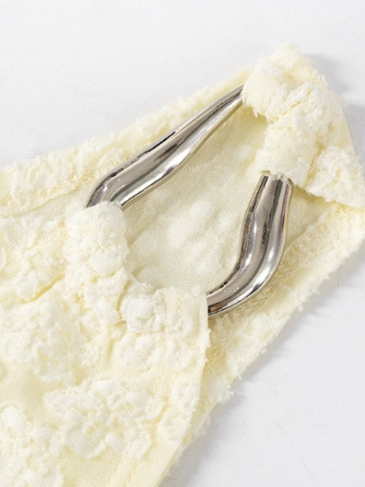 Crème top met één schouder