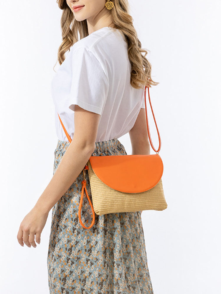 Afneembare schouderband van grasgeweven clutch