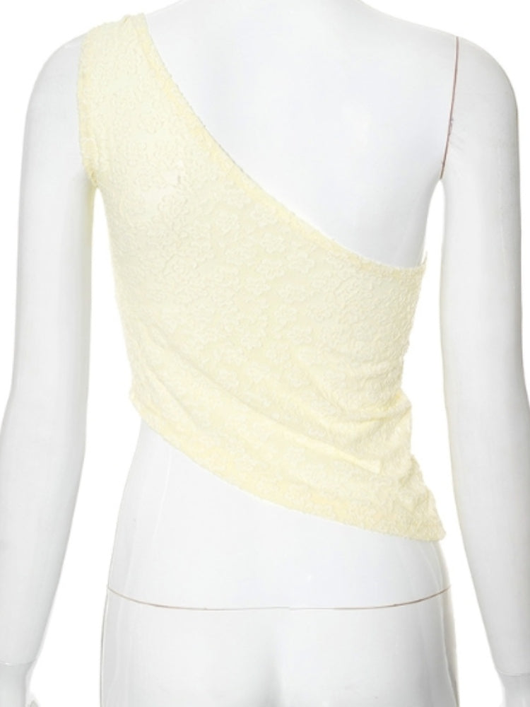 Crème top met één schouder