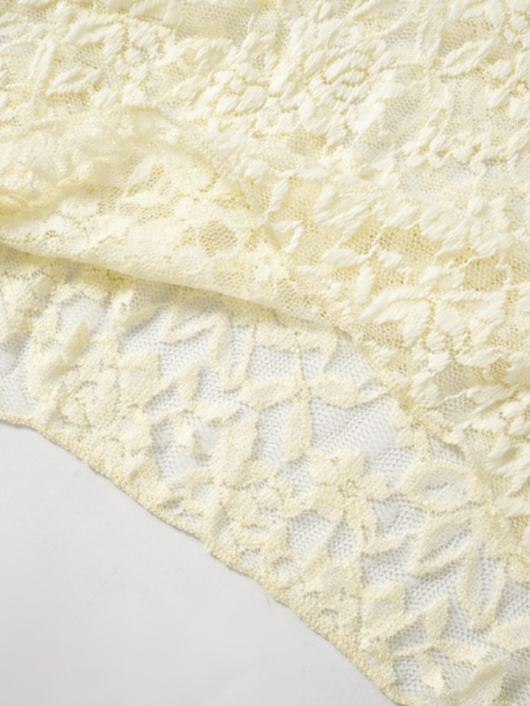 Crème top met één schouder