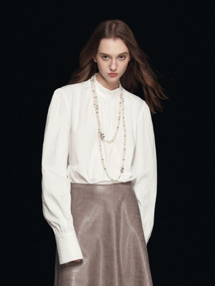Blouse met nephals en pofmouwen