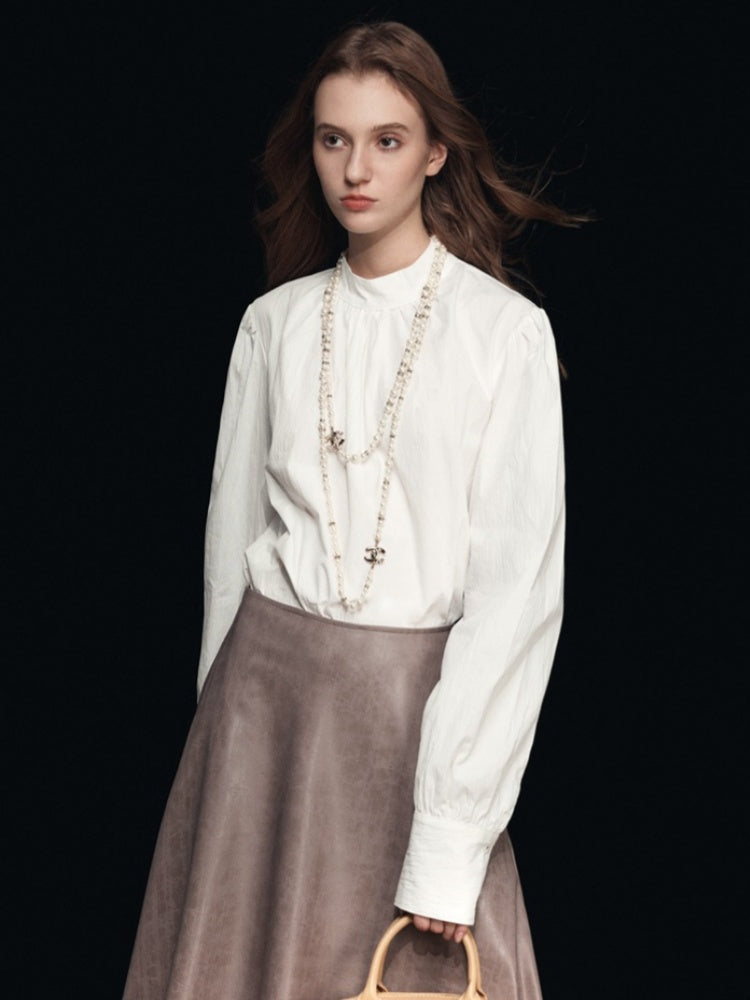 Blouse met nephals en pofmouwen