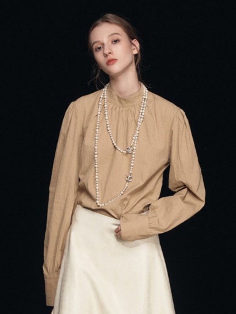 Blouse met nephals en pofmouwen