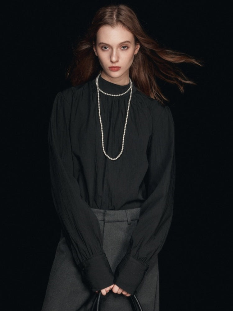 Blouse met nephals en pofmouwen