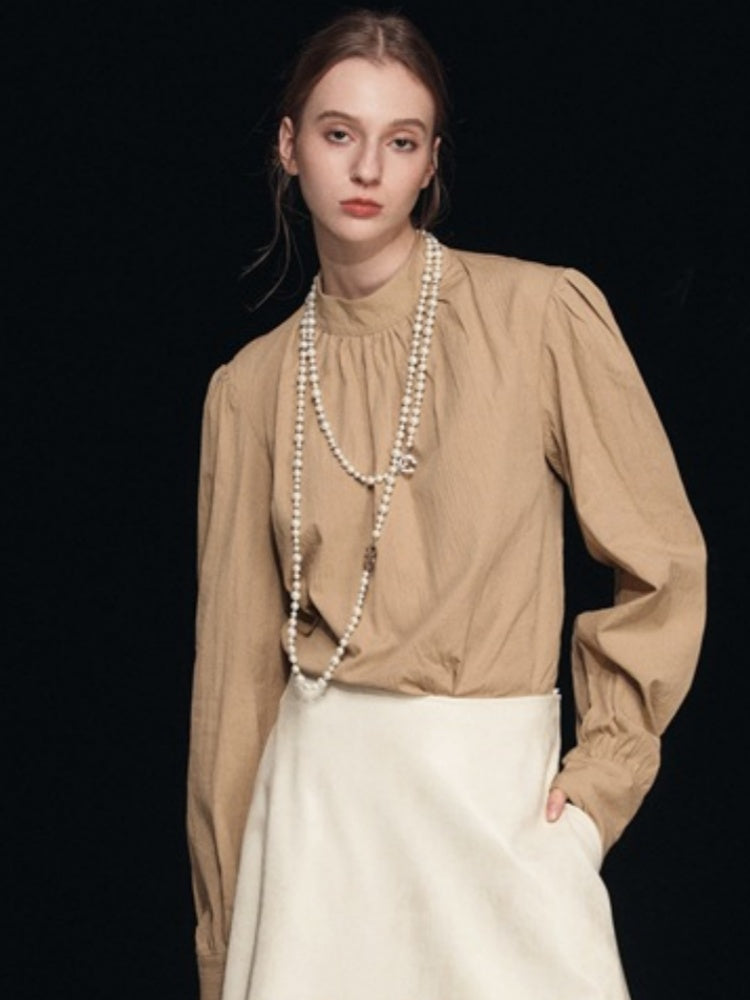 Blouse met nephals en pofmouwen