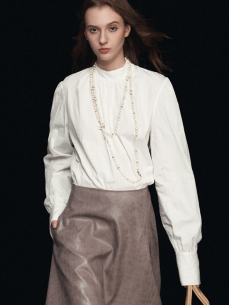 Blouse met nephals en pofmouwen
