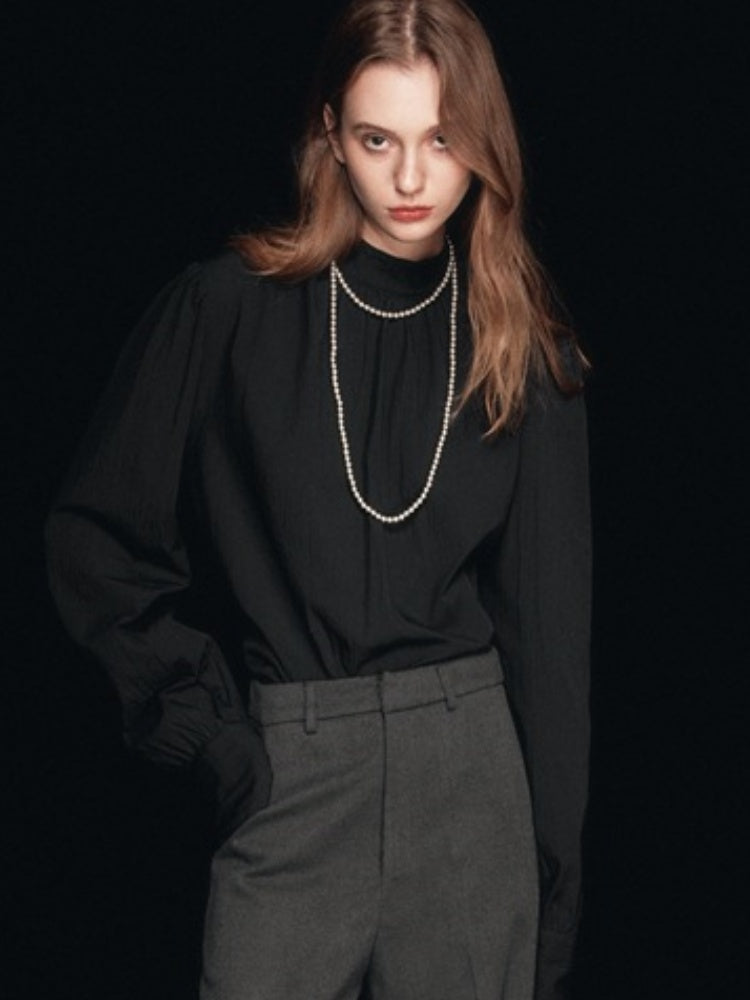 Blouse met nephals en pofmouwen